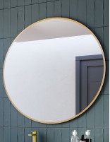 Espejo circular dorado modelo redondo de Coycama