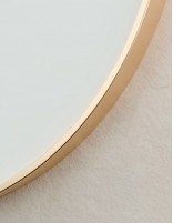 Espejo circular con marco y luz detalle