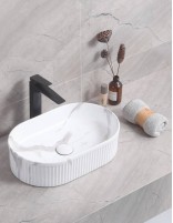 Detalle Lavabo fino CORINTO OVALO CALACATTA de Probath
