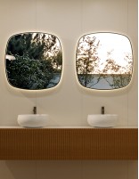 Espejo con bordes redondeados ambiente